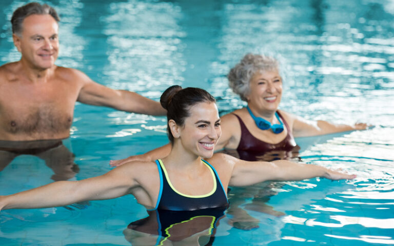 Group of people exercising in a pool